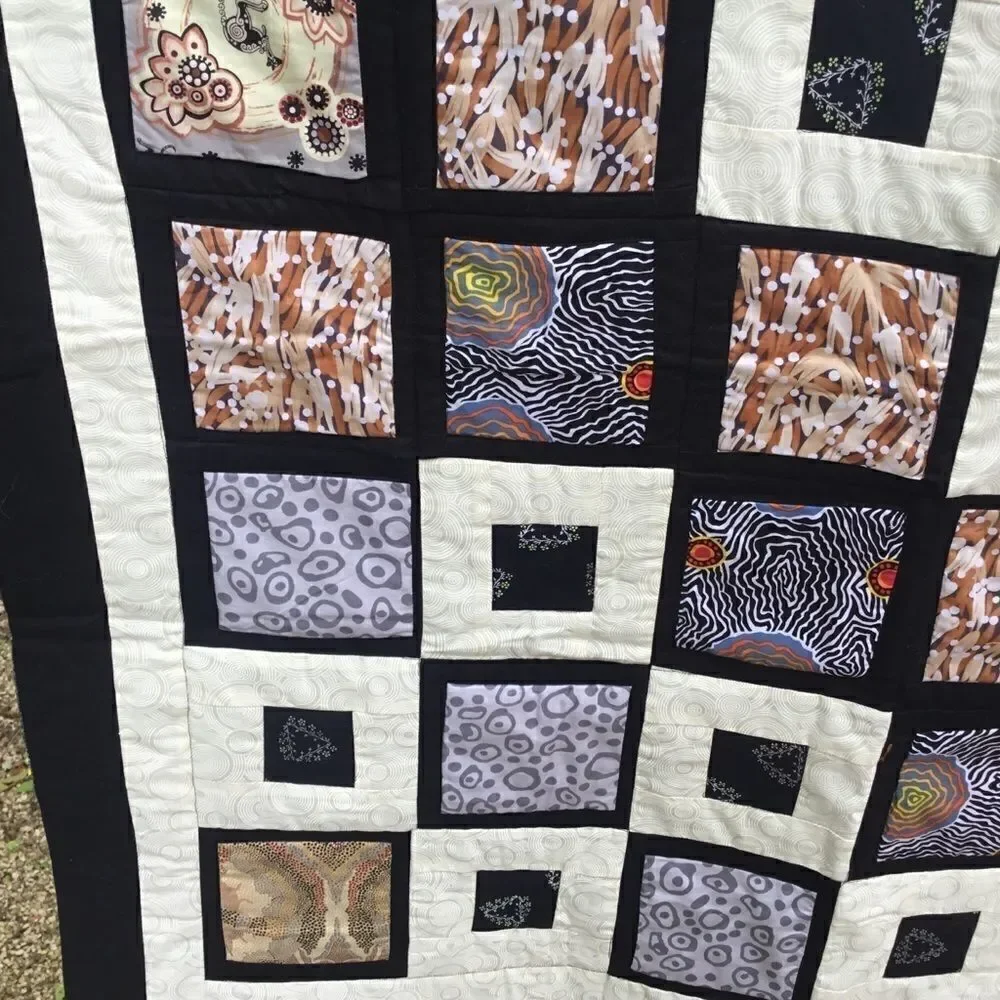 NWT. Hand Crafted Aboriginal Prints Quilt